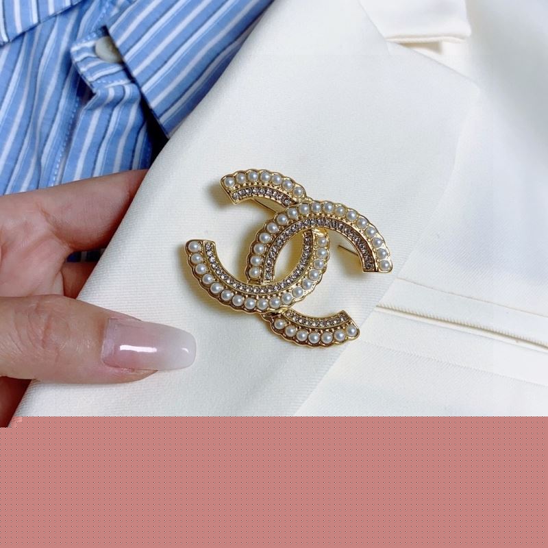 Ch*el brooches